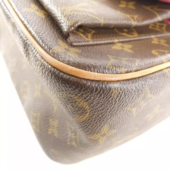 Authentic LOUIS VUITTON Monogram Exantri Cite - Picture 10 of 16